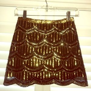 Gianni Bini black skirt with gold sequins